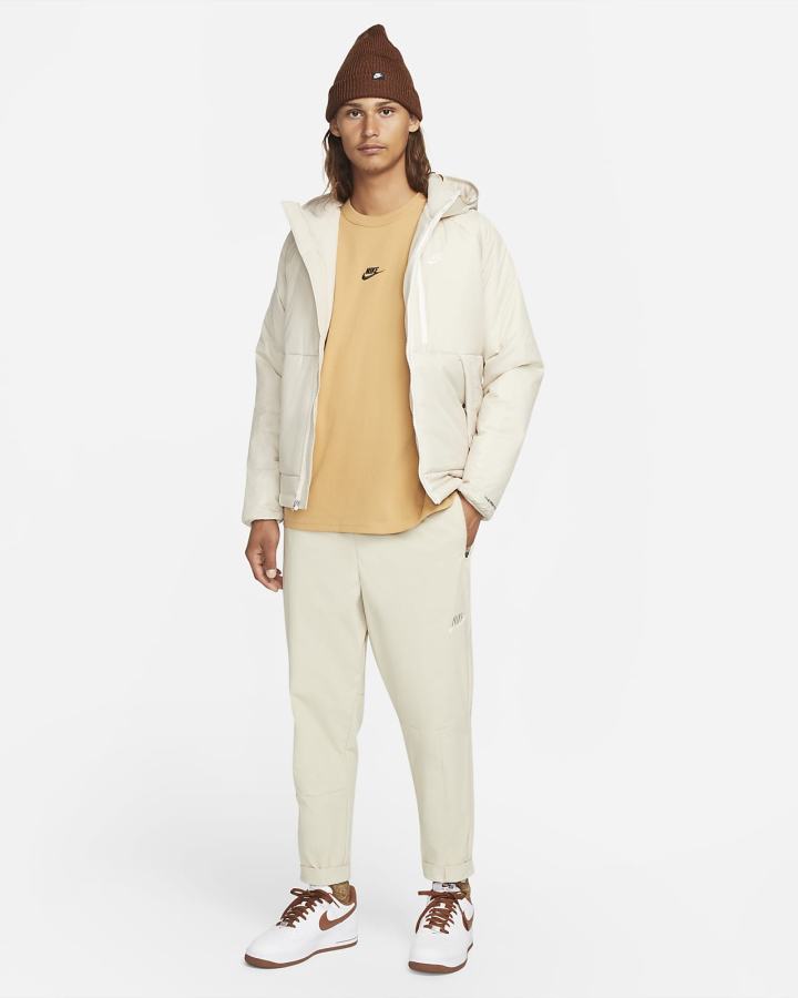 Camiseta Nike Sportswear Premium Essentials Hombre Doradas | VSRKL-1867