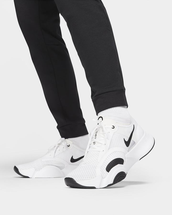 Pantalones Nike Dri-FIT Tapered Training Hombre Negras Blancas | YIFPJ-8605