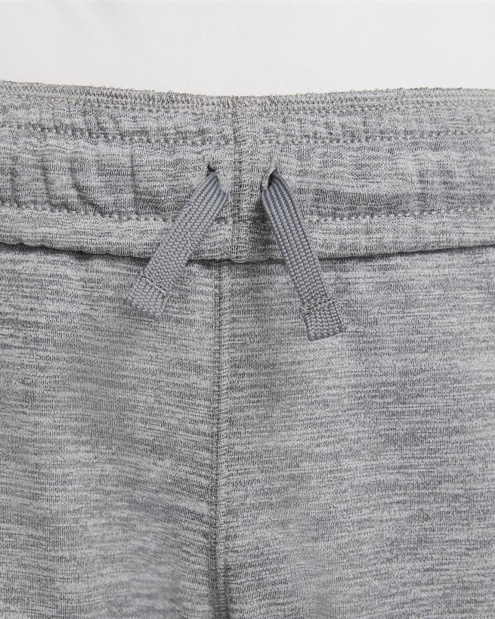 Pantalones Nike Therma-FIT Kids Estampadas Tapered Training Niño Gris | NOLZF-9263